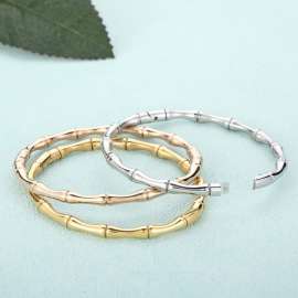 Steel color concealed buckle bamboo link bracelet with high rise polished knots